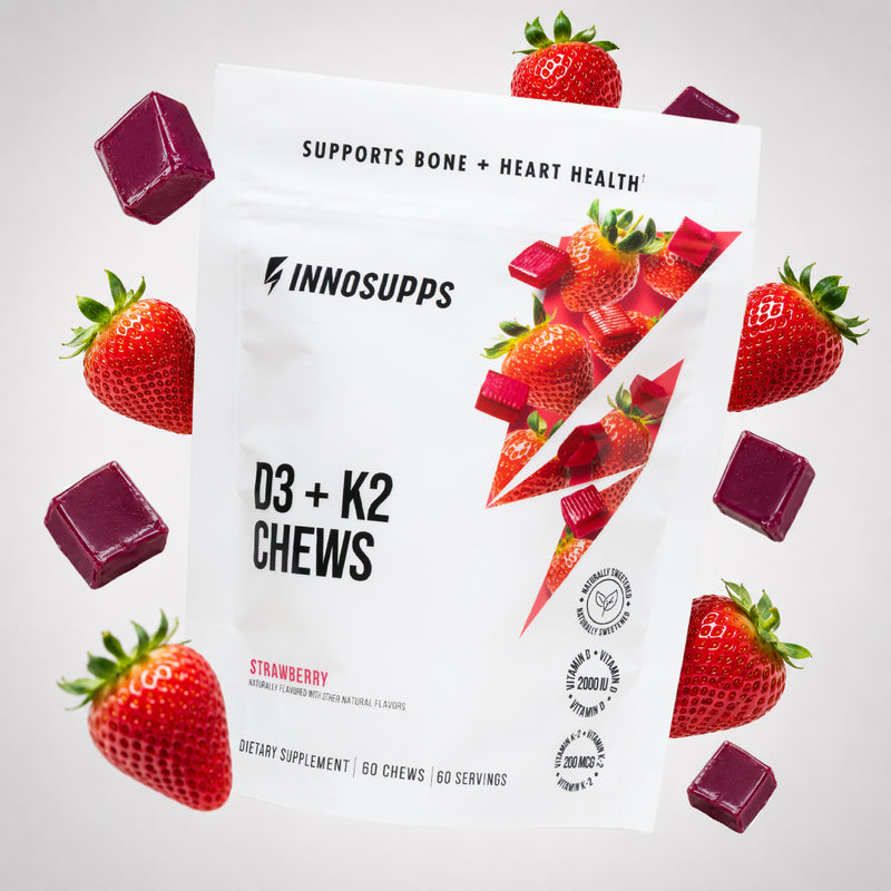 Inno Supps Strawberry D3 + K2 Chews pouch displayed with fresh strawberries and strawberry chews, highlighting the naturally flavored daily vitamin supplement. 
